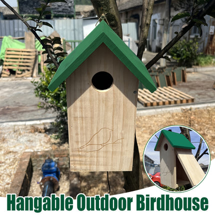 Hanging outdoor wooden birdhouse with green roof mounted on tree - wild bird nesting box for garden