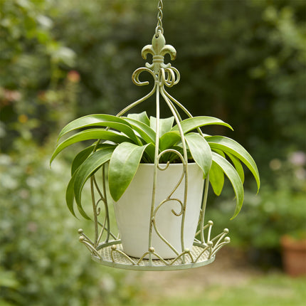Mesh base of iron hanging flower basket showing drainage holes - standard pot size compatible planter