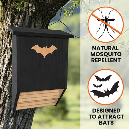 Outdoor wooden bat house in garden setting - attract bats for natural insect pest control