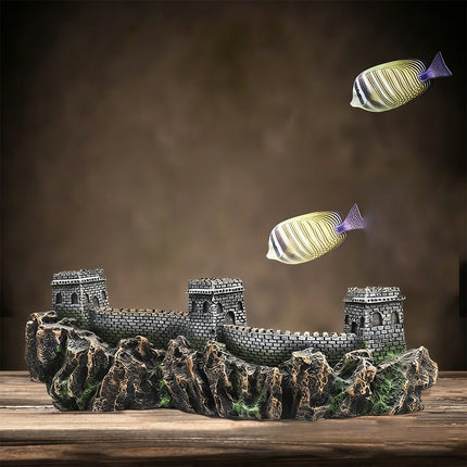 Great Wall aquarium ornament in fish tank setting with striped tropical fish swimming above resin decor