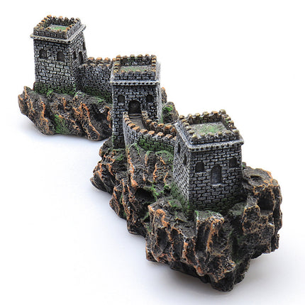 Resin Great Wall fish tank ornament angled view showing tower detail and mossy rock base texture