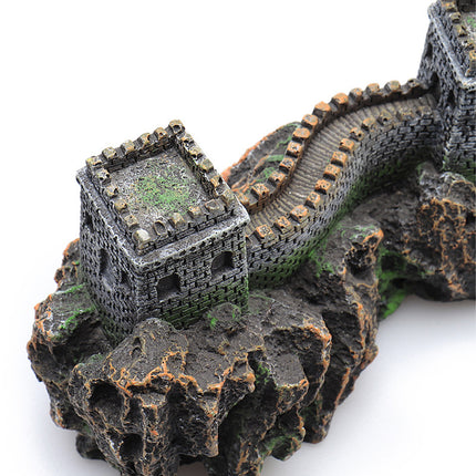 Close-up detail view of resin Great Wall aquarium ornament tower and wall texture