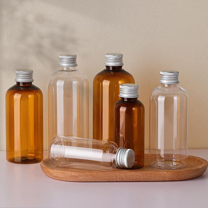 20pcs Brown Transparent Cosmetic Bottles with Aluminum Lids for Packaging