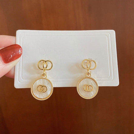 French Retro Vintage Pearl Earrings Hollow Circle High-end Needle Design