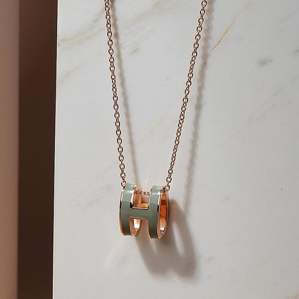 High version clavicle chain H enamel letter POP necklace women's oval rose gold pendant jewelry factory wholesale