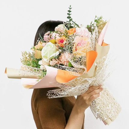 Chocolate wrapping paper rolls in four vibrant colors for flower and gift packaging