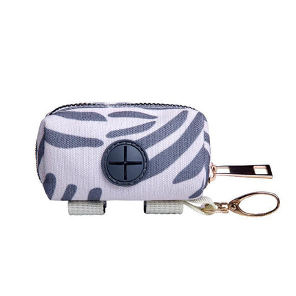 Secure and stylish dog poop bag holder for outdoor use.