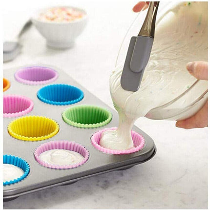 Colorful Silicone Muffin Cups filled with freshly baked muffins.