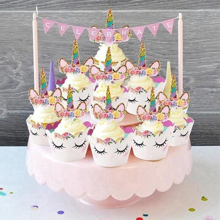 Unicorn Cupcake Topper and Wrapper on festive cupcake.